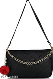 Black purse with red tassels