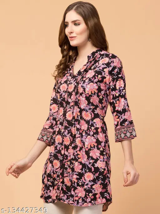 Black and white checkered rayon shirt dress for women, three-quarter sleeves, pleats detailing, attached side belts