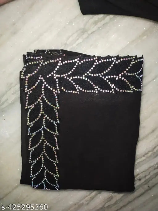 Georgette saree, black, with sequined border and decoration