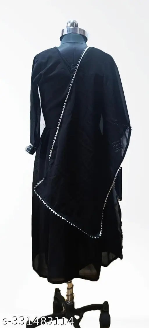 Black Georgette maxi dress with dupatta set, A-line party kurta for girls aged 6-15, features silver work and long sleeves. Ideal for Navratri and casual western wear. Hand wash only