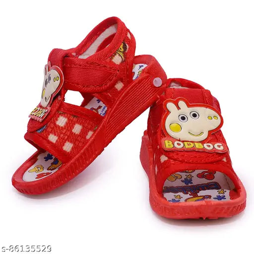 Red shoes with cartoon character motifs