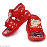 Red shoes with cartoon character motifs