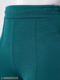 Stylish vintage ladies high-rise bell-bottom trousers, teal velvet material