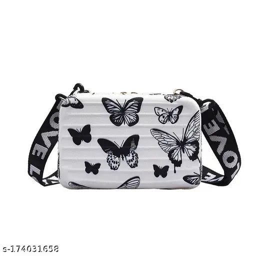 Black sling box bag for women, featuring butterfly pattern and detachable shoulder strap, convertible into cosmetic case