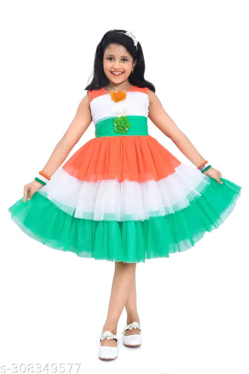 Red and green colorblocked net sleeveless frock for Independence Day, perfect for kids aged 5-9 years. Made in India