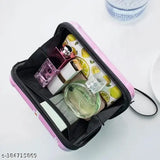 Pink sling box, clear plastic lining, contains cosmetics and toiletries