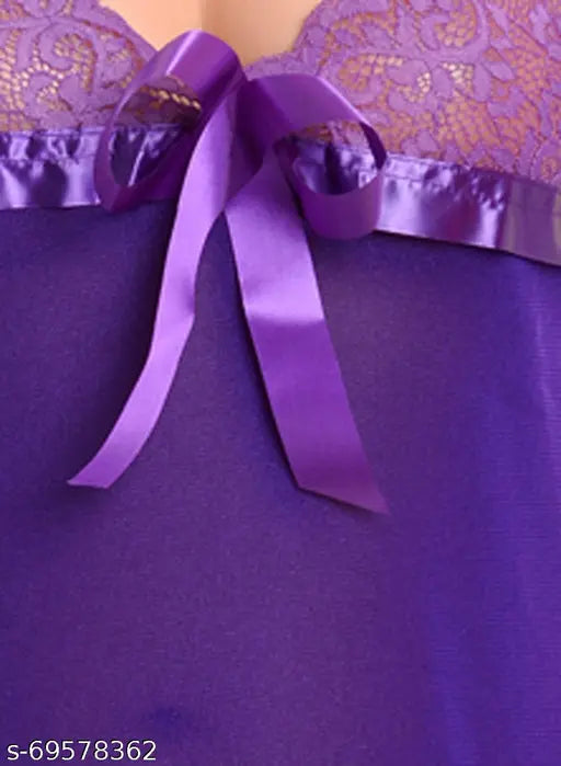 Purple lace babydoll lingerie with satin ribbon, dark blue fabric.
