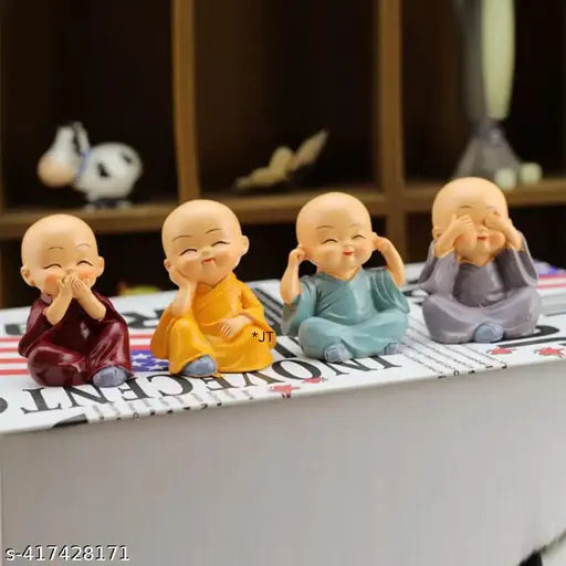 Hand-crafted Indian Baby Buddha Set of 4 religious idols for home and office decorations. Portable and lightweight showpiece with easy-to-use design