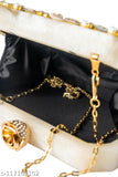 Handicraft clutch with metallic finish and crystal embellishments