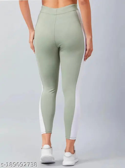 Solid net Earth Joy Sportswear jeggings (90% polyester, 10% spandex), perfect for women's workout and yoga outfits. Made in India