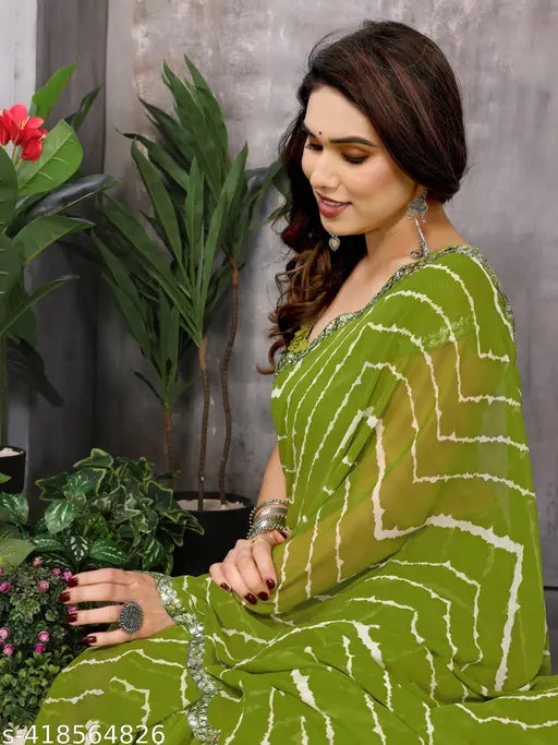Georgette printed sari in shades of green and yellow with leheniya print