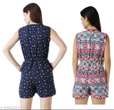Navyblue star-Red crepe sleeveless knee-length jumpsuit for women and girls, featuring printed floral design, side zip closures, pockets, and tie-up belt - Indian origin