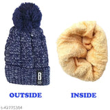 Woolen navy blue beanie with fur lining and pompom in photo