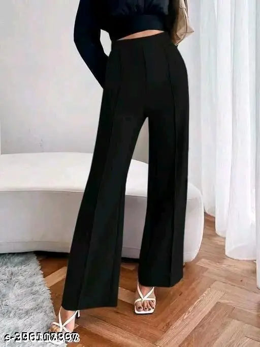 Black palazzo pants with karakari design and golden chain accents