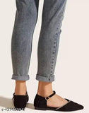 Dark blue denim jeans with rolled-up cuffs