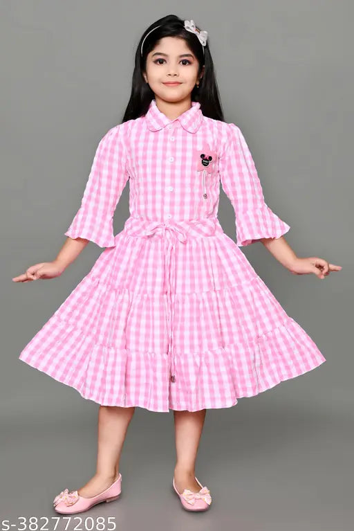 Hot pink gingham check dress with puffy sleeves and skirt, suitable for young girls