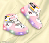 Pink and white kids' casual light-up shoes with Velcro closures