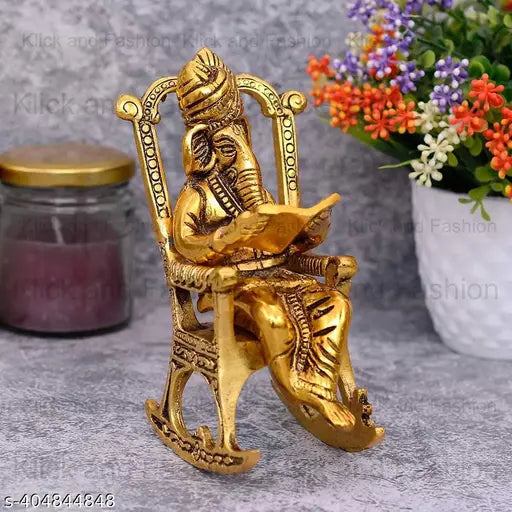 Metal Ganesh reading statue, detailed work, Diwali decorative showpiece