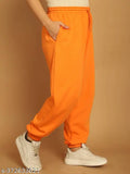 Orange nylon solid jogger pants by NOBARR, ankle-length with drawstring detail and elasticated waistline, made in India