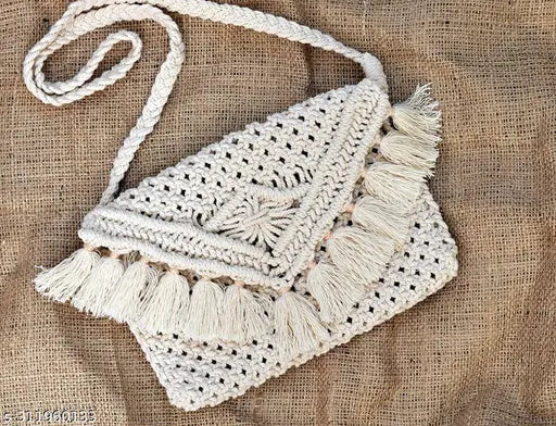 Handcrafted woven macrame tote bag, with tassel details and fringe trim. Ethnic style design, perfect as a mother's day gift