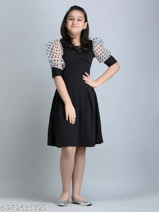 Black cotton blend round neck frock dress for girls, solid pattern, short sleeves, size 7-8 years, made in India