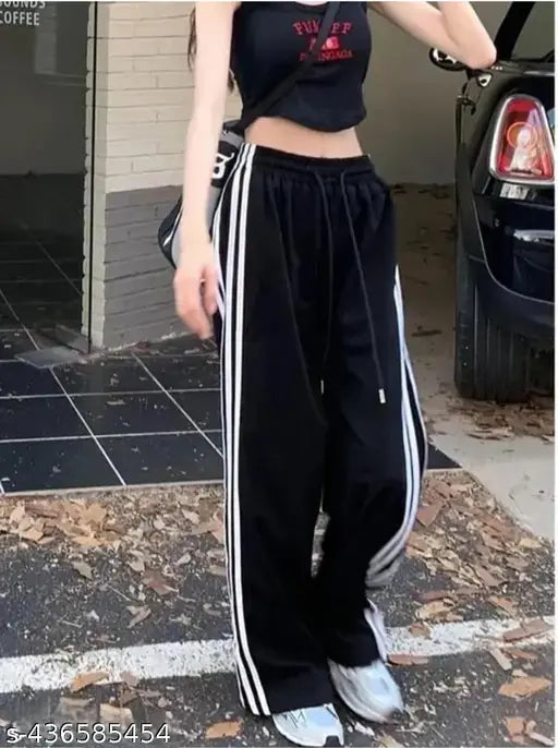 Black baggy pants with white stripes
