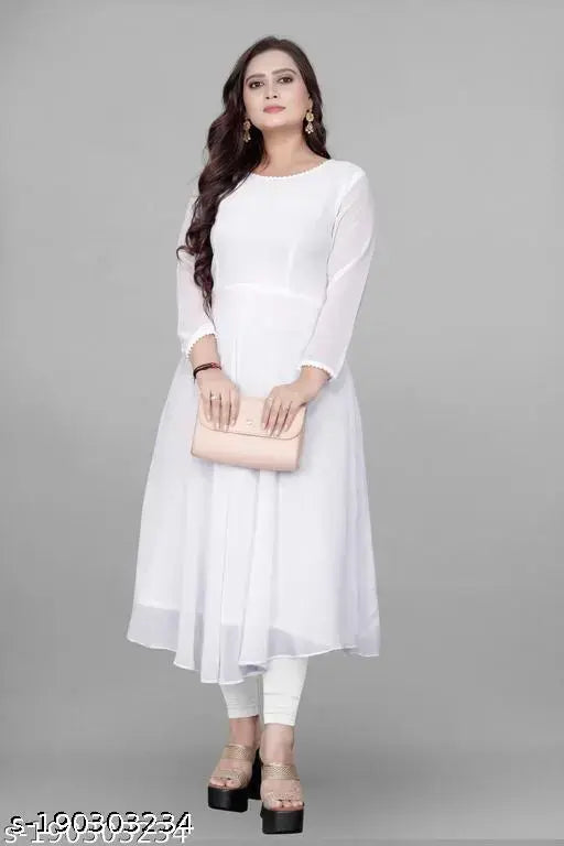 White kameez dress with long sleeves and knee length, worn by woman with clutch purse