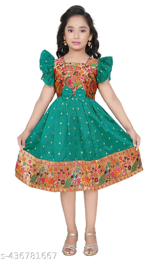Green and red children's cross-over dress with black trim