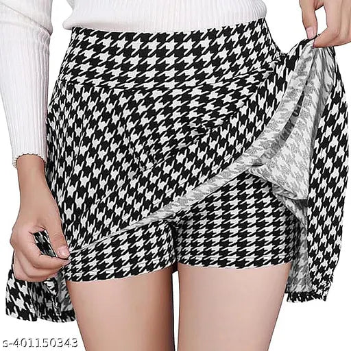 Cotton blend checked net skater skirt with attached inner shorts and flared inskirt. Multilayer waist with stretchable elastic band, mid-waist length, suitable for tall thin girls. Available sizes: 26, 28, 30, 32. Origin: India
