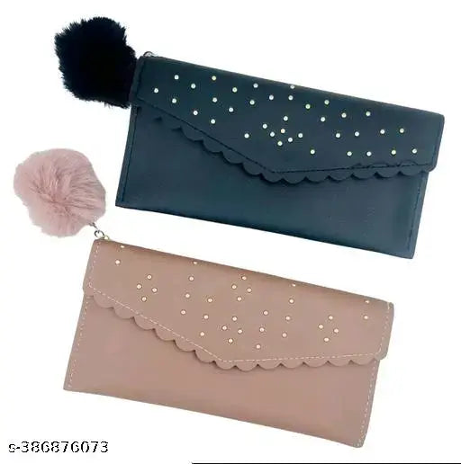 Black leather clutch, ruffle detailing, with round studs on straps and fringe accents