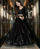 Black embroidered net Lehenga Choli set, intricately embellished for traditional festivals and weddings