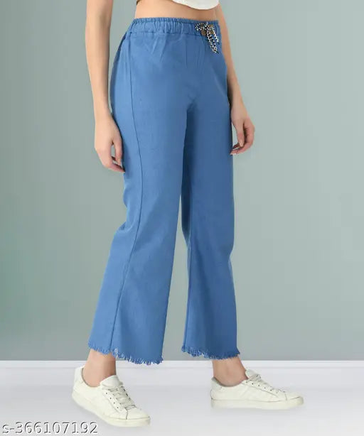 Light blue stretchable women's flared denim jeans with elastic waist and ankle cuffs