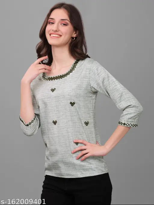 Green cotton blend mirror worked top with three-quarter sleeves, perfect for party, wedding, festival, and traditional wear