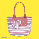 Red and white striped fabric tote, with large bow, pink polka dots, and multiple pockets or compartments