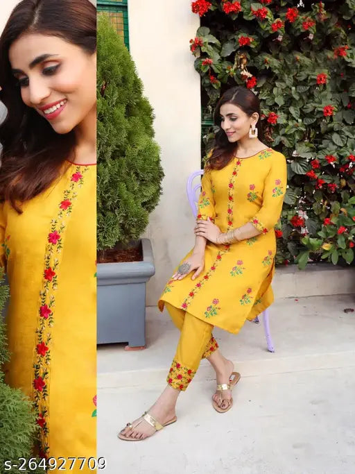 Blue-embroidered kameez set in budget store, perfect for Christmas and New Year celebrations