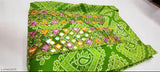 Green Rayon Bandhni Styles Kurti with three-quarter sleeves, embellished with multi-color applique embroidery, traditional Jaipuri Sanganei print. Women's fashion clothing accessory from India