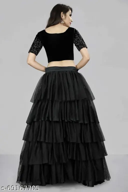 Black embroidered semi-stitched lehenga choli with net dupatta, featuring ruffle pattern and unstitched choli on a satin base