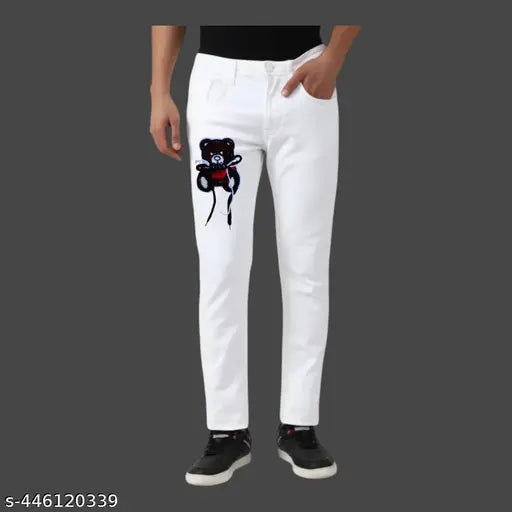 White cotton slim fit pants with a large graphic of a brown teddy bear on the left leg