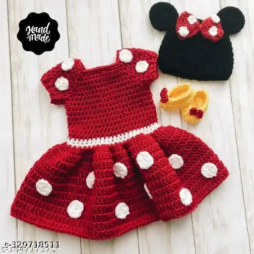 Red wool baby dress with self-design net pattern, short sleeves, suitable for sizes from 0-3 months to 18-24 months. Made in India