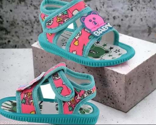 Baby sound sandals with panda print, pink lining, and sound feature