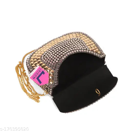 A shiny metal sling bag with a gold and silver finish, suitable for parties or casual outings