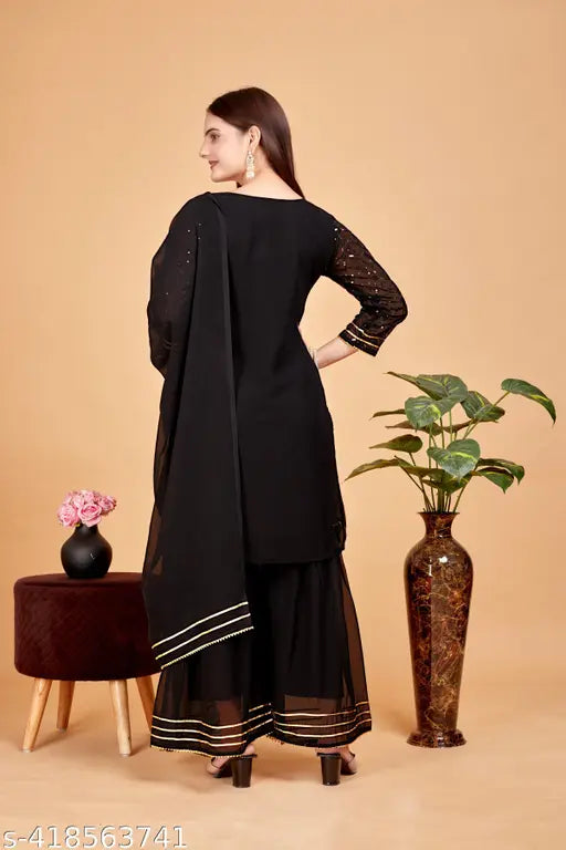 Women's kameez set, embroidered black with beige border, long sleeve