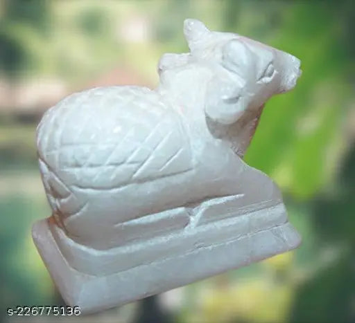 White marble Nandi idol, intricate Indian handicraft artifact, 5cm height
