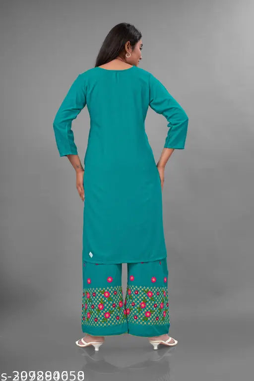 Green embroidered rayon kurta set with dupatta and A-line palazzos - Indian traditional ethnic wear featuring floral design, three-quarter sleeves, and comfortable rayon fabric