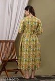 Yellow cotton ikat print maternity kurti/gown with adjustable back robe, three-quarter sleeves, and discreet feeding access. Indian made, size S-XXXL