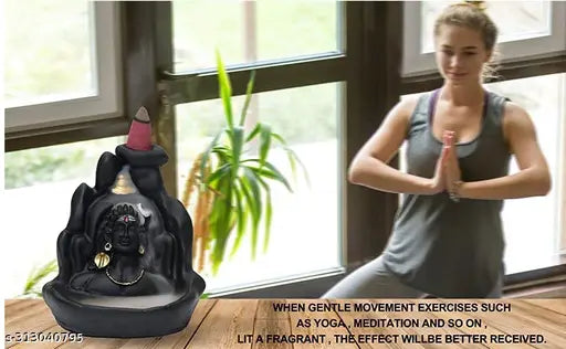 Handcrafted poly resin Adi Shankara statue, features Lord Adiyogi Mahadev - a replica of the Guinness World Record bust sculpture. Ideal decorative showpiece for festive occasions or as a unique gift. Dimensions: 10cm breadth x 11cm height x 8cm length. Made in India