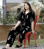 Black cotton nightsuit set for women, featuring a printed kaftan-style top and matching pyjama bottoms with elastic waist and drawstring. Ideal for comfortable sleepwear or loungewear. Made in India