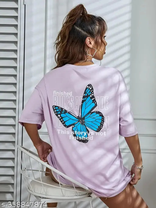 Oversized women's t-shirt in pastel purple with a large blue butterfly on the back
