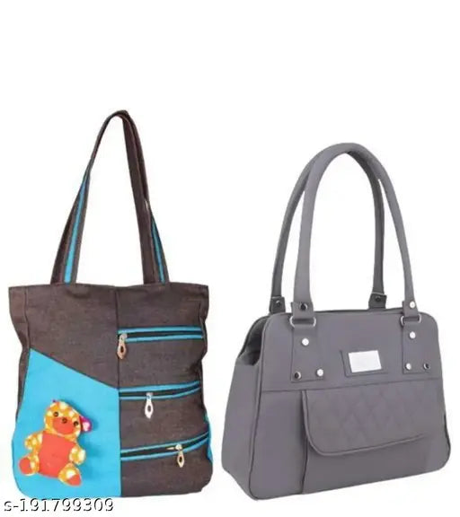 Stylish black handbag with a blue accent, featuring a bear emblem on one side, and a flap top closure
