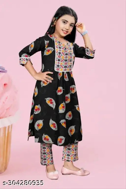 Cotton printed Reyon top & trousers set for kids girls, A-line style with three-quarter sleeves. Made in India." (106 characters)